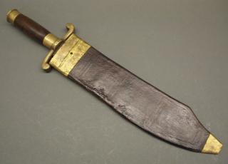 Appraisal: Bowie knife A Bowie knife Having a wood handle with