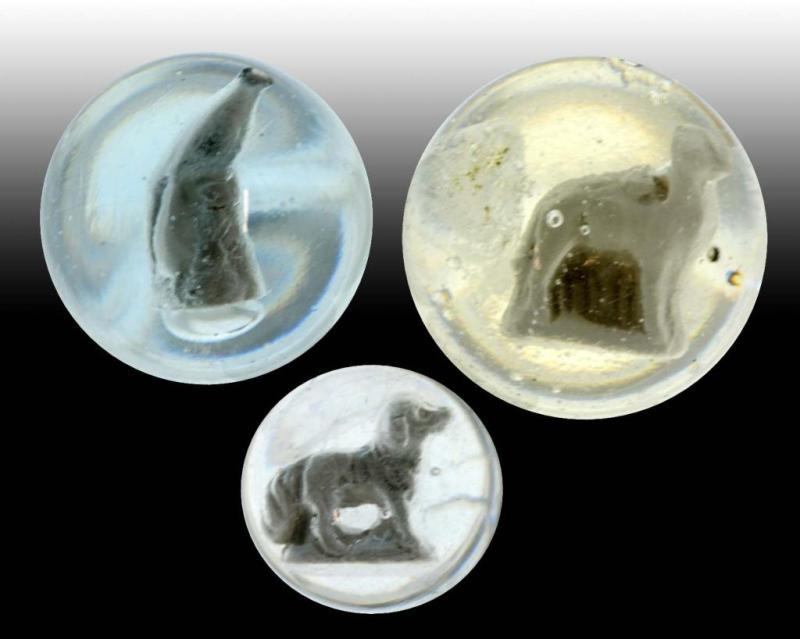 Appraisal: Lot of Animal Sulphide Marbles Description Includes a camel dog