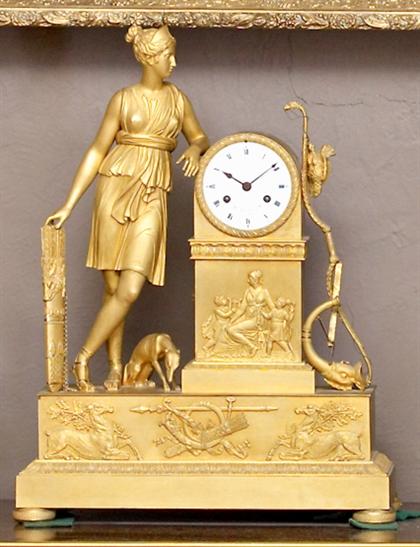 Appraisal: Classical gilt metal mantel clockDepicting Diana dial signed 'LeRoy du