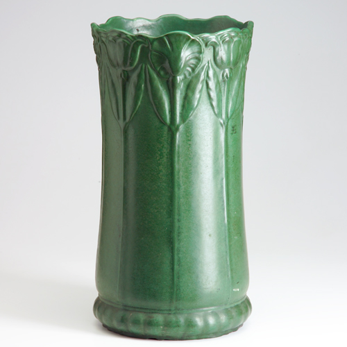 Appraisal: WELLER Matte Green umbrella stand embossed with tall poppies A