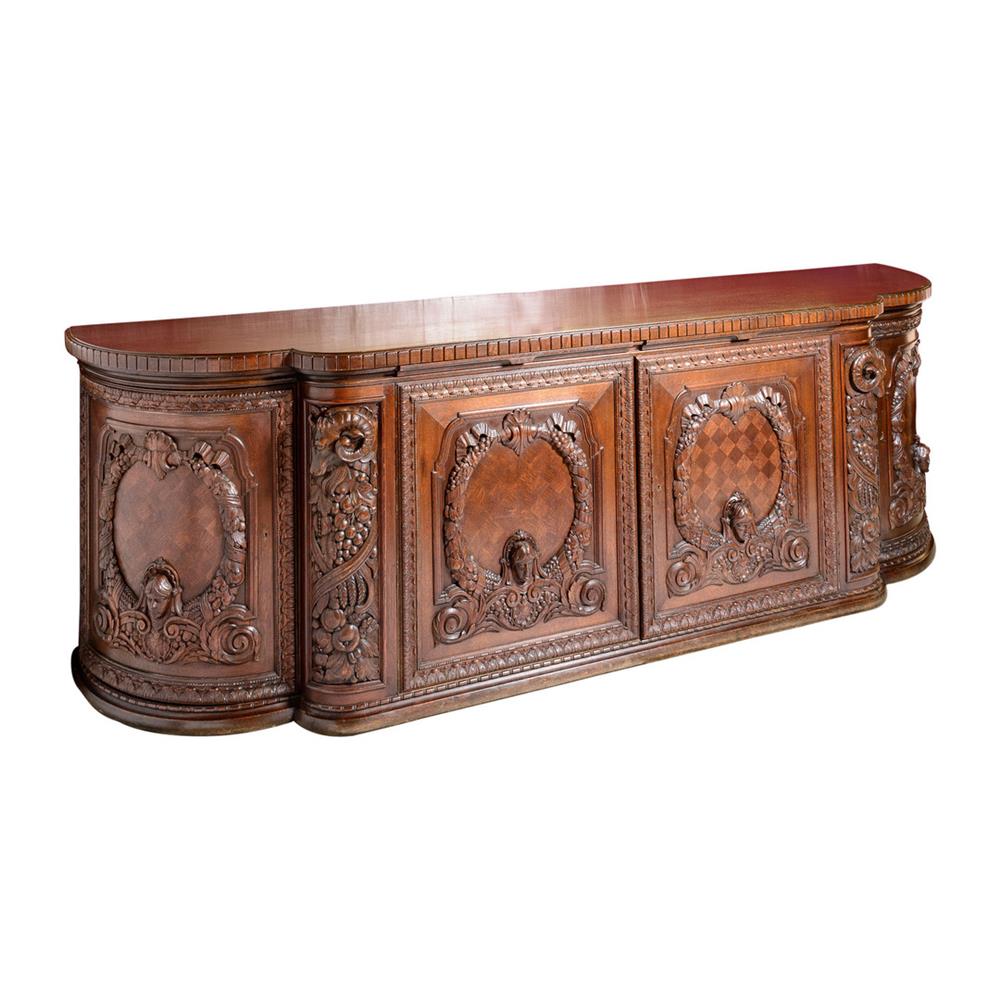 Appraisal: FRENCH PROVINCIAL CARVED OAK SIDEBOARD having a rectangular top with