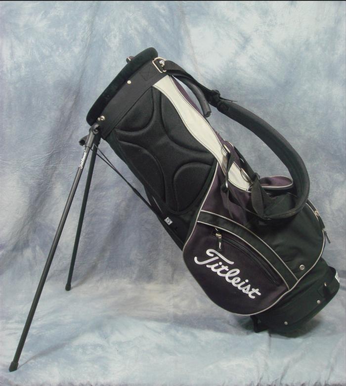 Appraisal: Titleist purple and black carry bag side pockets and stand