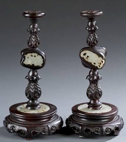 Appraisal: Pair of Chinese carved rosewood incense tapers A pair of