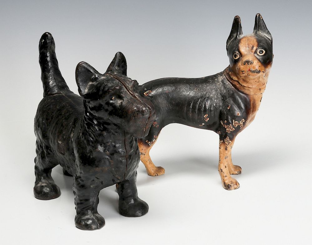 Appraisal: TWO GOOD ANTIQUE DOG DOORSTOPS A Boston Bull Terrier in