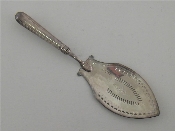 Appraisal: An Irish silver lanceolate fish slice with pierced and bright