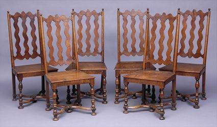 Appraisal: SET OF SIX JACOBEAN-STYLE WALNUT HALL CHAIRS Each scalloped top