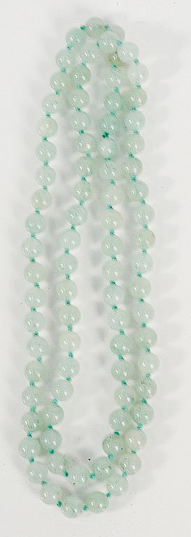 Appraisal: Jadeite bead necklace single knotted pale green mm lg in