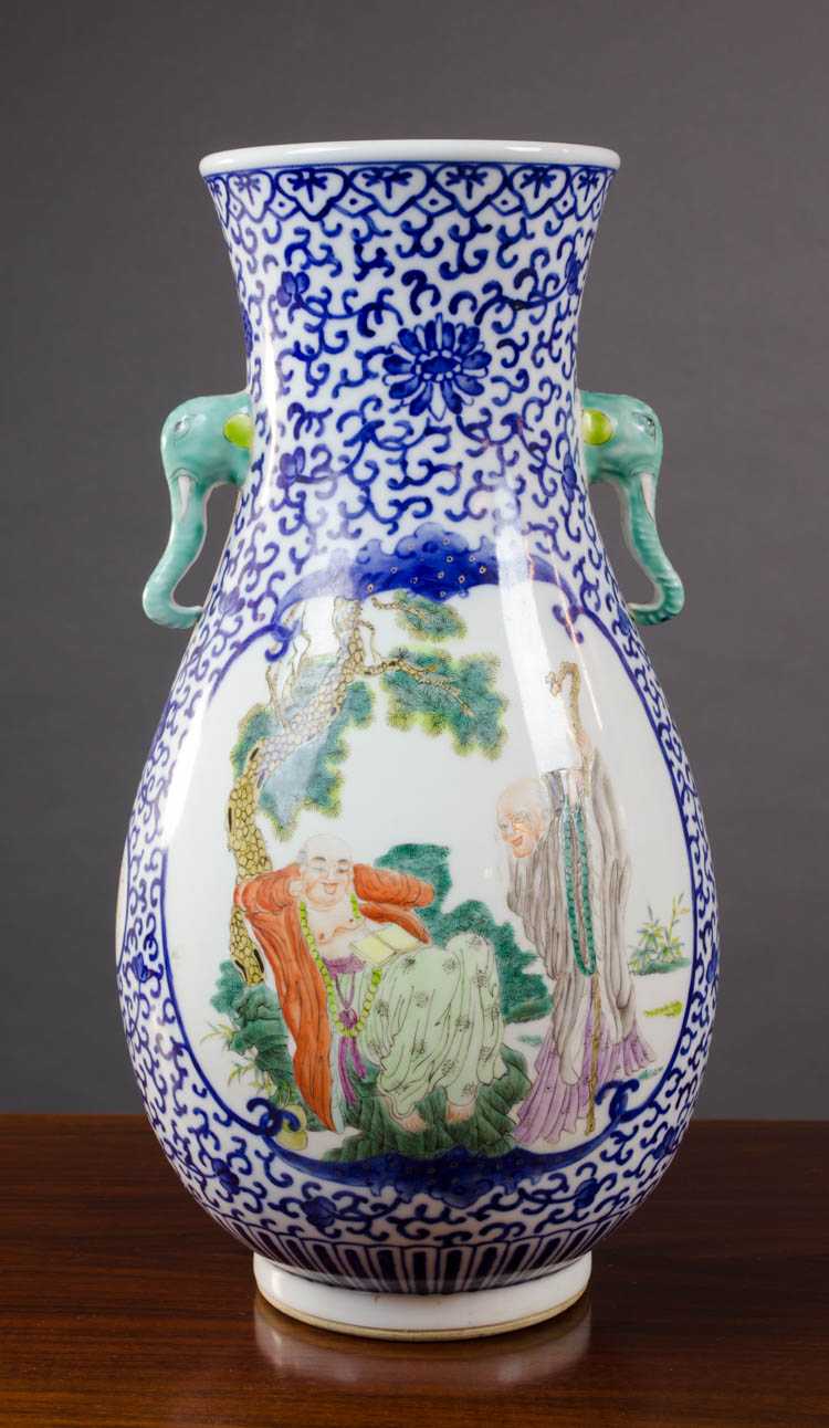 Appraisal: CHINESE PORCELAIN VASE baluster form with elephant mask handles featuring