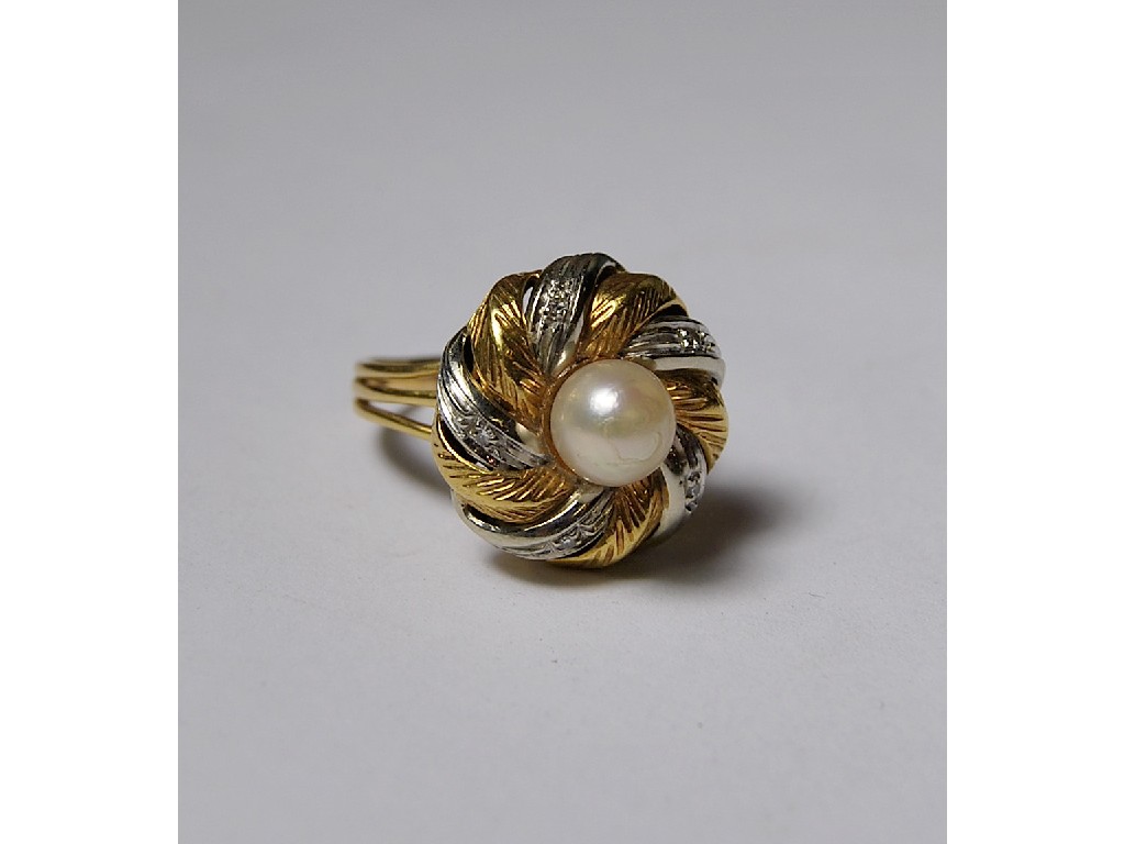 Appraisal: White and yellow metal turban-style ring set diamond and single