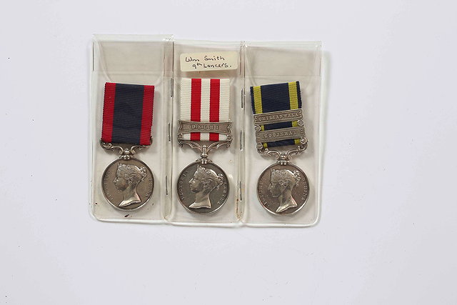 Appraisal: A GROUP OF THREE MEDALS awarded to William Smith of