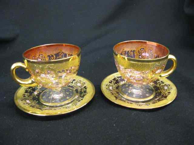 Appraisal: Pair of Moser Art Glass Cup Saucers cranberry to clear