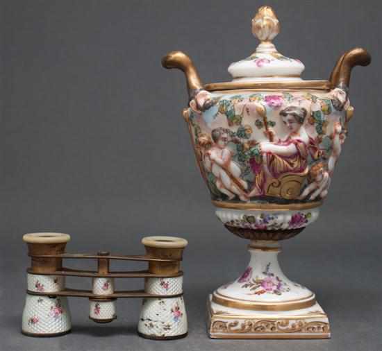 Appraisal: Capodimonte porcelain covered urn together with a pair of gilt-brass