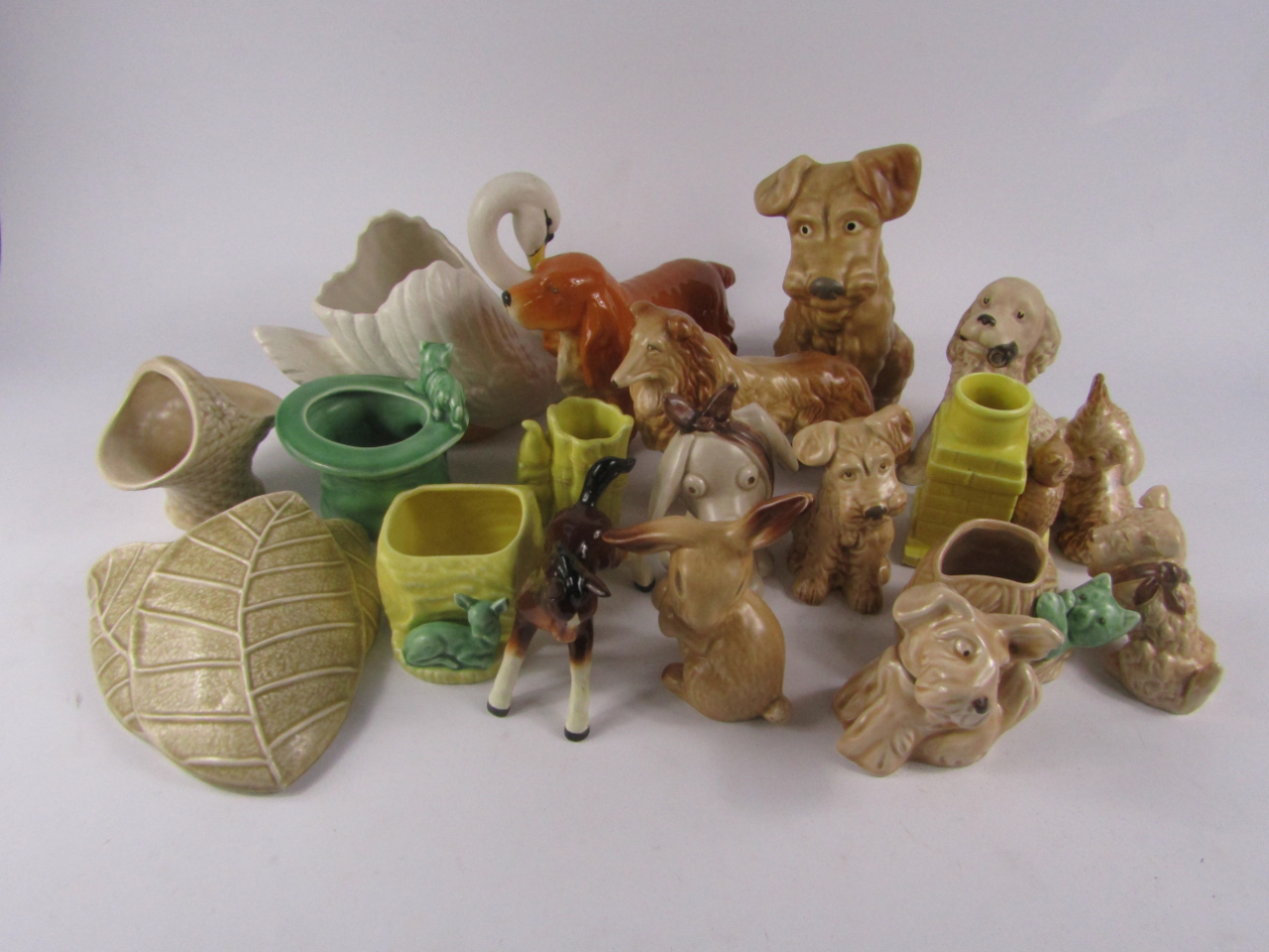 Appraisal: Sylvac matt pottery character animals vases and a wall pocket