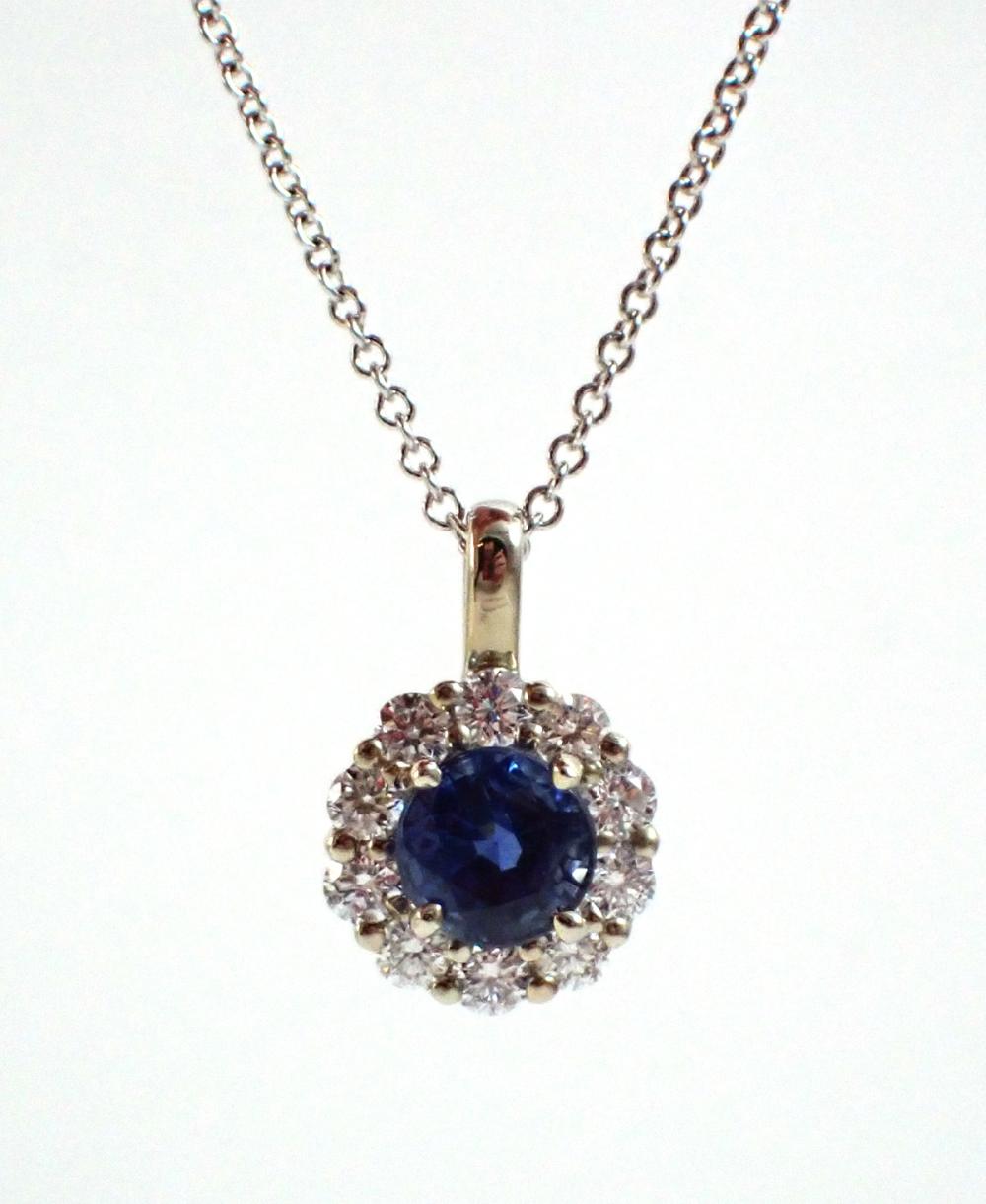 Appraisal: DIAMONDS BLUE SAPPHIRE AND FOURTEEN KARAT WHITE GOLD PENDANT NECKLACE