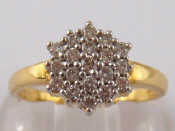 Appraisal: A yellow metal tests carat gold diamond cluster ring head