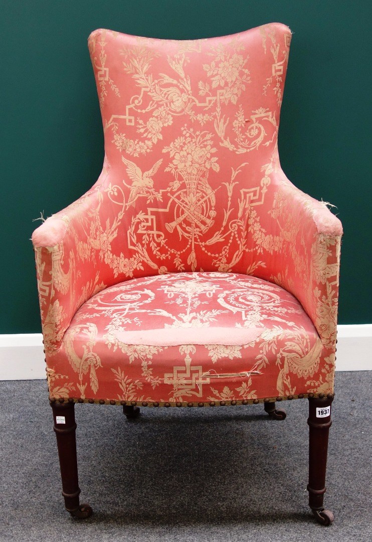 Appraisal: A th century shaped tub back easy armchair on tall