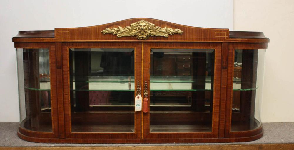 Appraisal: LOUIS XVI STYLE MAHOGANY AND GLASS COUNTERTOP CURIO CABINET Continental