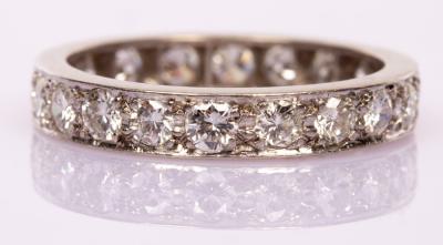 Appraisal: A diamond eternity ring set with twenty brilliant cut stones