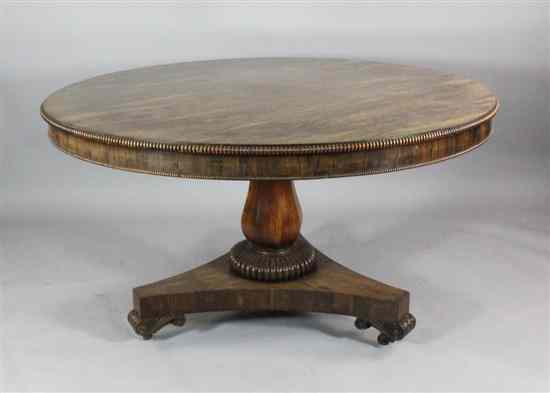 Appraisal: A William IV rosewood breakfast table with gadrooned edge on