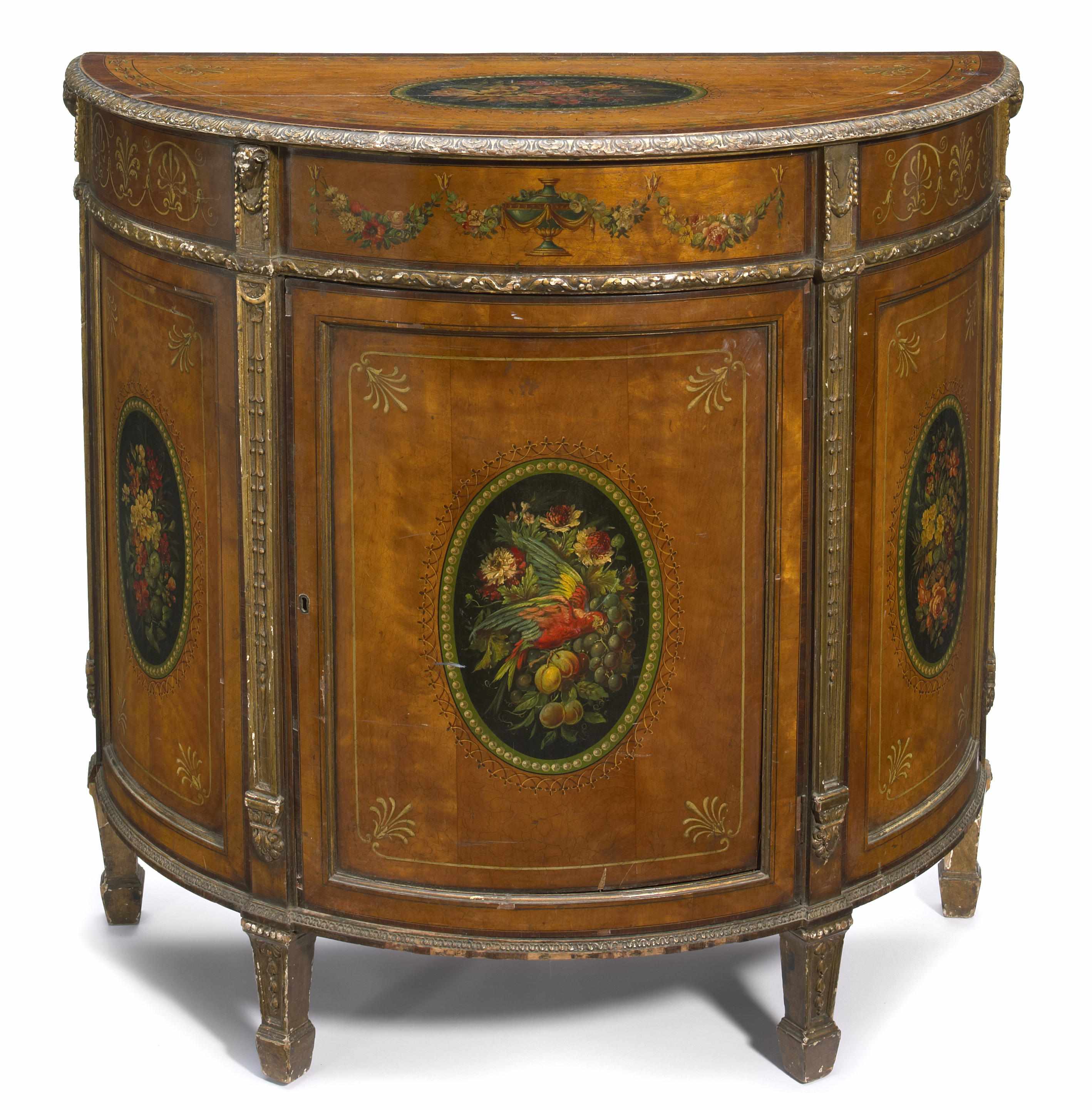 Appraisal: A George III style parcel gilt paint decorated satinwood demilune