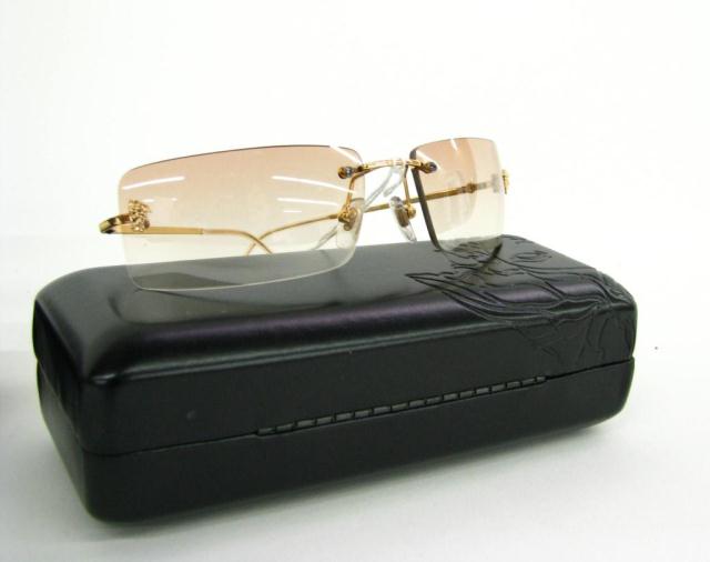 Appraisal: Gianni Versace rimless brown gradient lens with medusa head detail