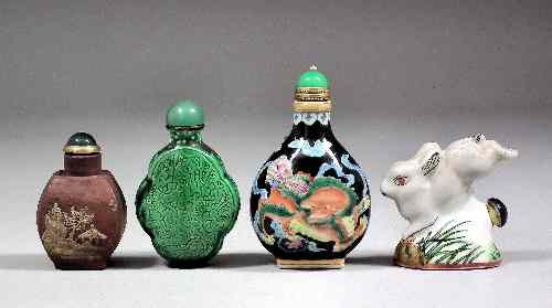 Appraisal: A Chinese porcelain Yixing slip decorated snuff bottle and stopper