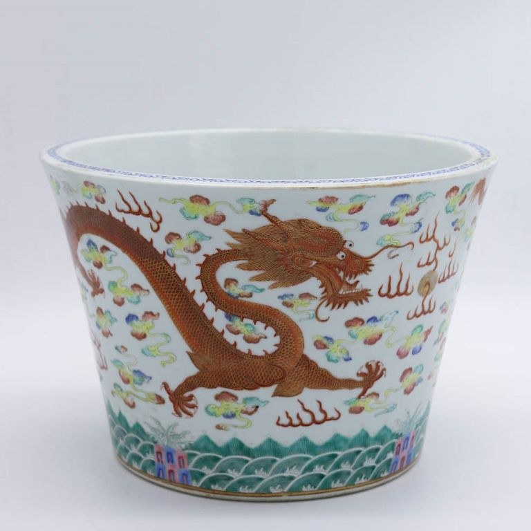 Appraisal: FAMILLE ROSE DRAGON JARDINIERE GUANGXU MARK Of tapering form the