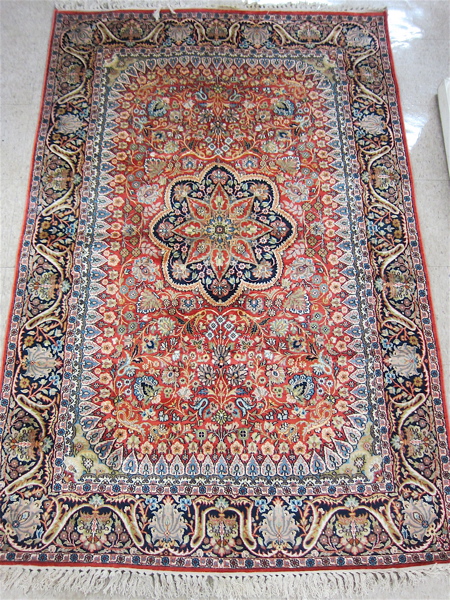 Appraisal: HAND KNOTTED ORIENTAL AREA RUG Kashmiri Kashan floral and central