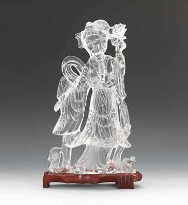 Appraisal: A Carved Kuan Yin Large carved clear glass figure with