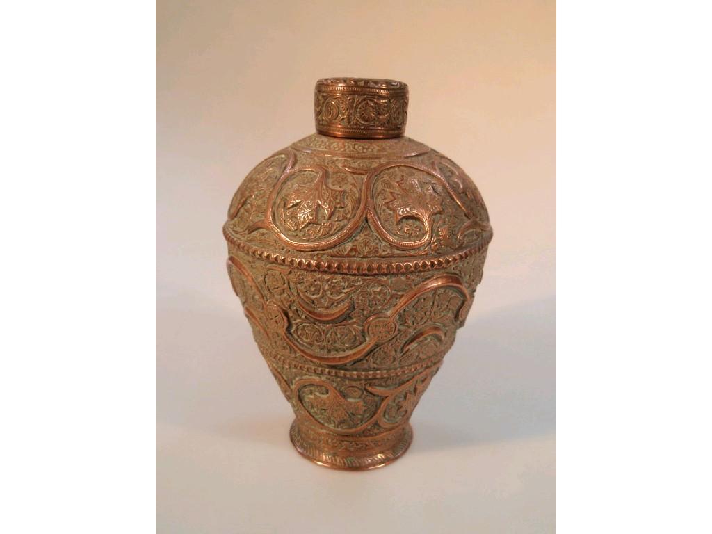 Appraisal: A late thC Indian copper ovoid jar and cover highly