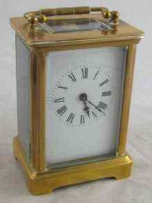 Appraisal: A French brass carriage clock with day French movement approx