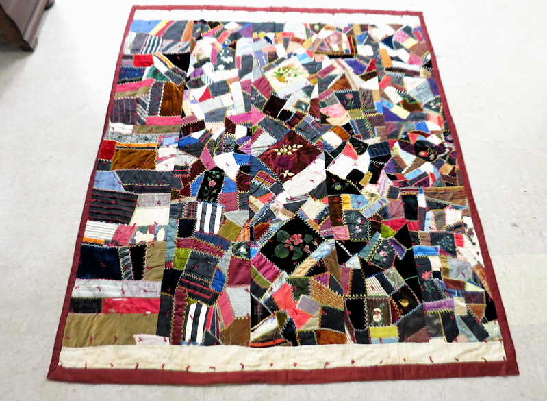 Appraisal: AMERICAN HAND PIECED CRAZY QUILT c having blocks of velvet