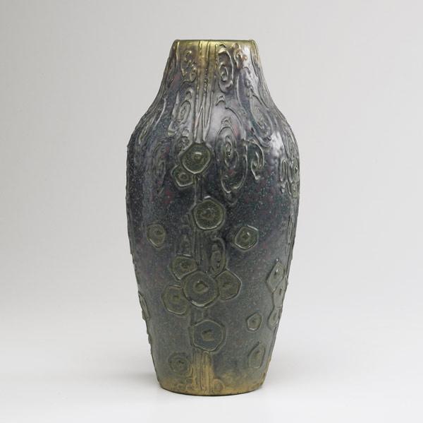 Appraisal: AMPHORA Tall vase with stylized blossoms under matte mottled glazes