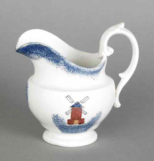 Appraisal: Blue spatter creamer with a windmill h