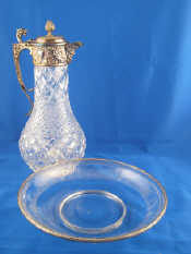 Appraisal: A cut glass claret jug with diamond and hobnail cut