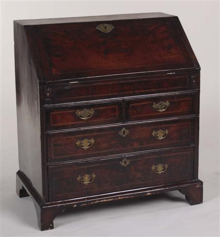 Appraisal: A George III mahogany bureau ALTERATION the boxwood and ebony