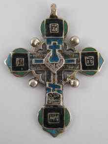 Appraisal: An Orthodox cross in white metal tests silver with enamel