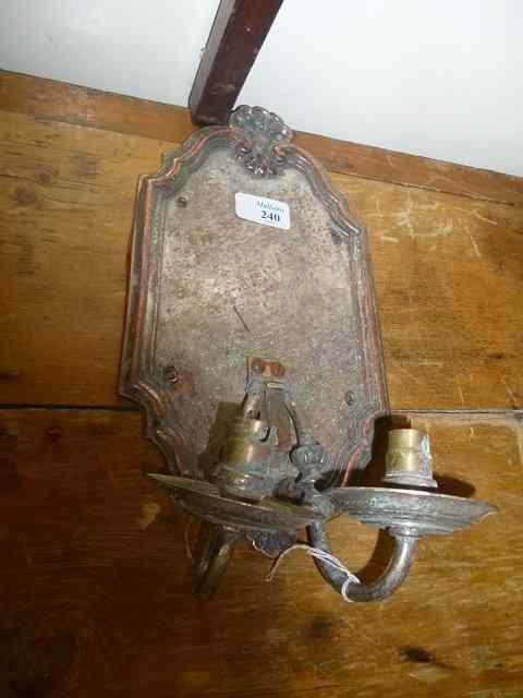 Appraisal: A SILVER PLATED WALL SCONCE with shell crest and two