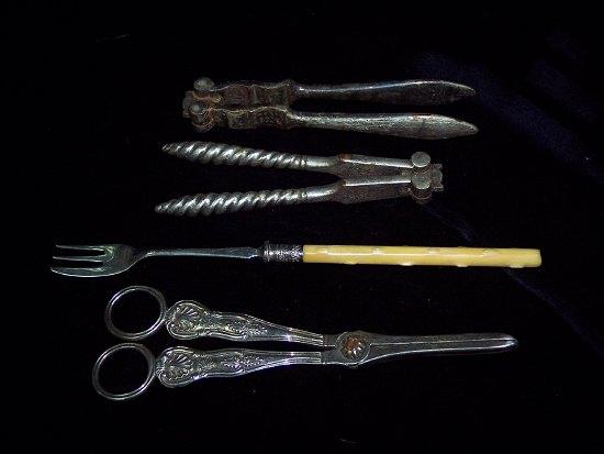 Appraisal: A pair of King's pattern grape scissors a pickle fork