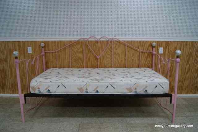 Appraisal: Pink Bent Wrought Iron Day Bed w Hearts DesignFrom an