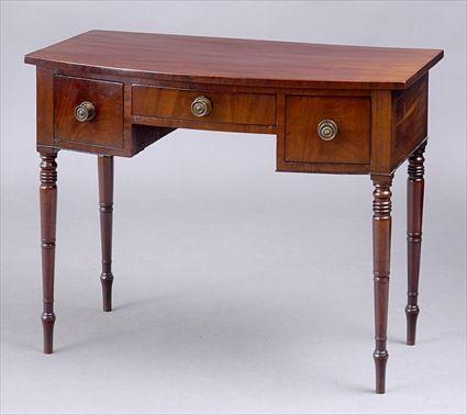 Appraisal: FEDERAL MAHOGANY BOW-FRONTED DRESSING TABLE The plain top above a