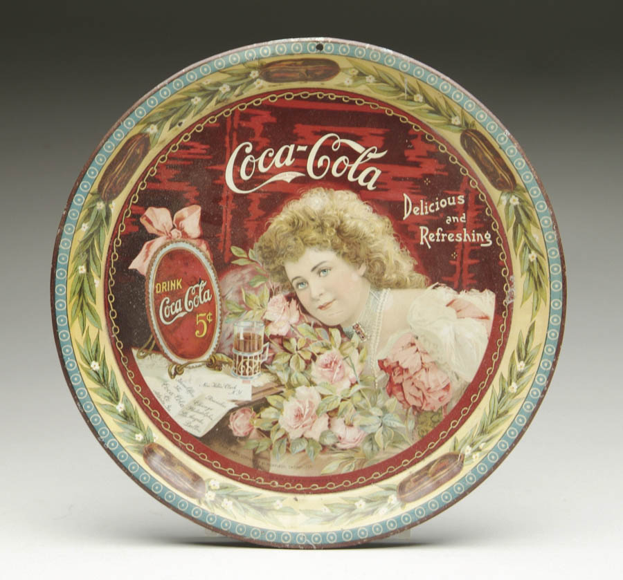 Appraisal: COCA-COLA SERVING TRAY Hilda Clark adorns the front of this