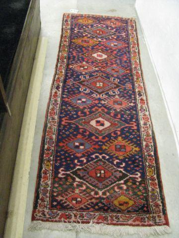 Appraisal: Heriz Persian Handmade runner geometrics red blues ivory ' x