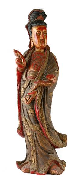 Appraisal: A Chinese polychromed lacquered wood standing Guanyin and seated Buddha