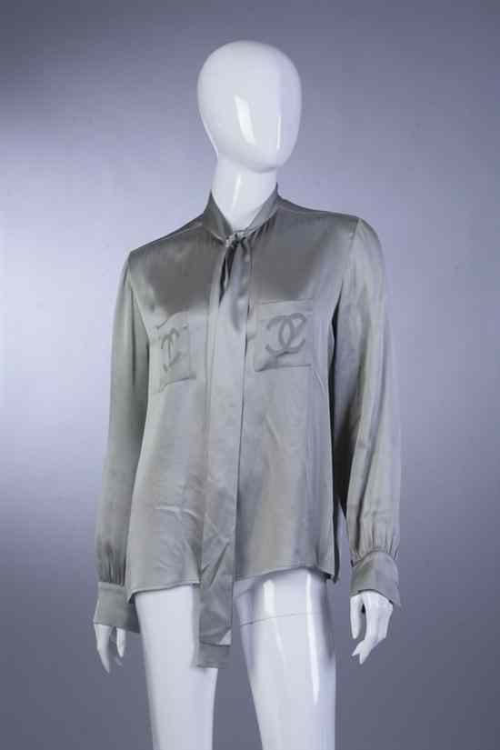 Appraisal: CHANEL GREY SILK BLOUSE late s size The pockets with