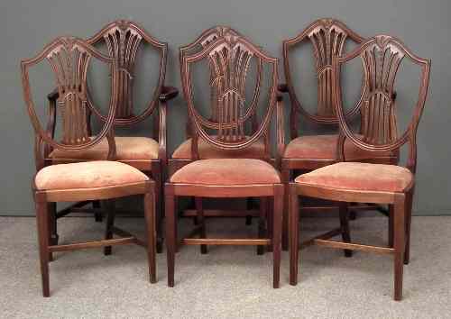 Appraisal: A set of five mahogany shield back dining chairs of