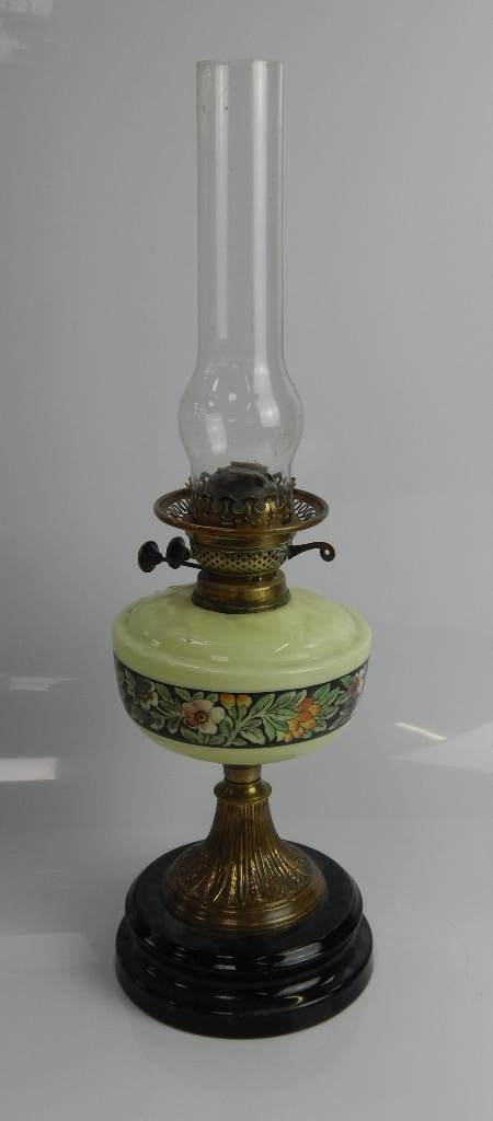 Appraisal: A Victorian brass oil lamp with glass reservoir