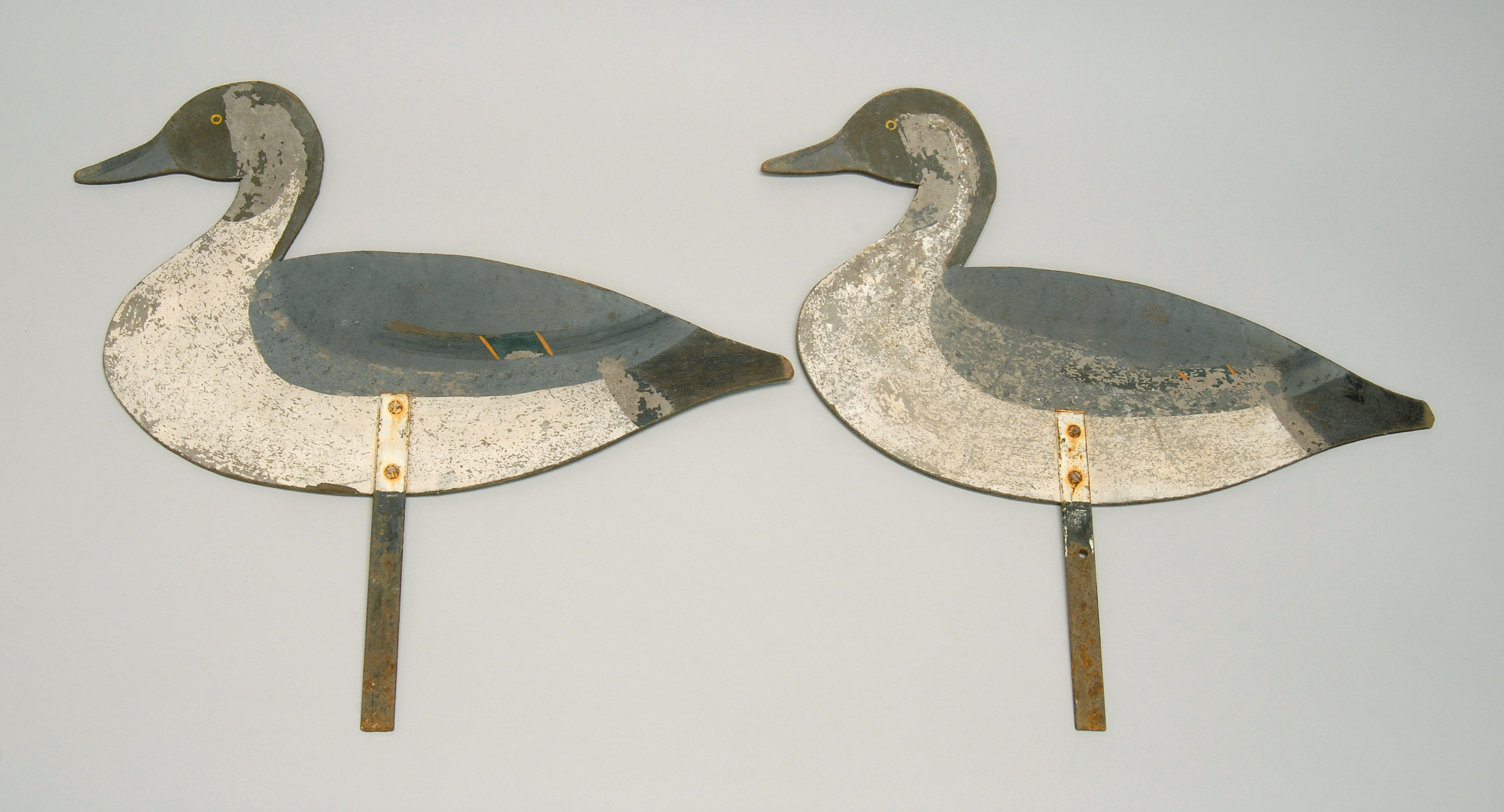 Appraisal: PAIR OF PINTAIL DRAKE SILHOUETTE DECOYS Maker unknown Original paint