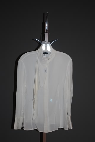 Appraisal: Giorgio Armani ivory silk long sleeve with ascot Size Neiman