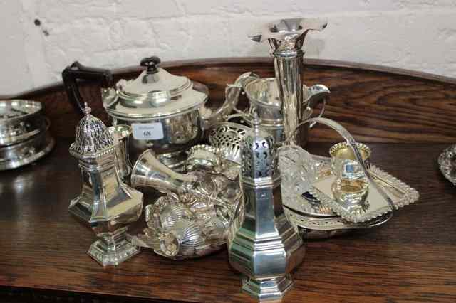 Appraisal: A SILVER THREE PIECE TEASET the teapot with looping plastic